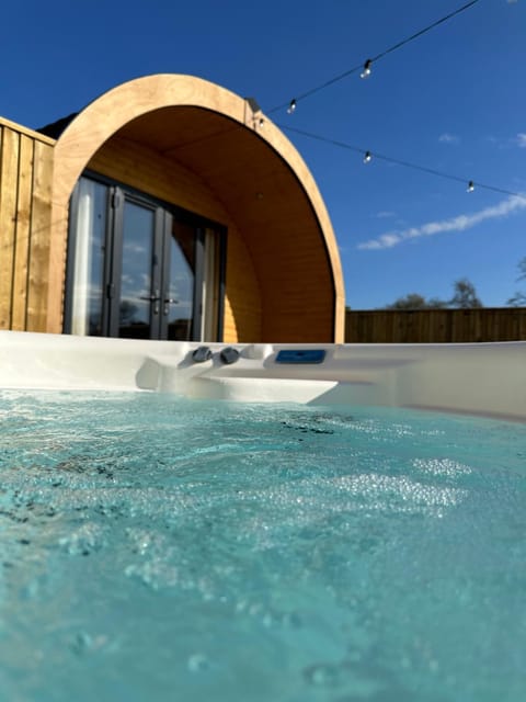 Lois' Pod with Hot Tub, Near Airport Campground/ 
RV Resort in Wales
