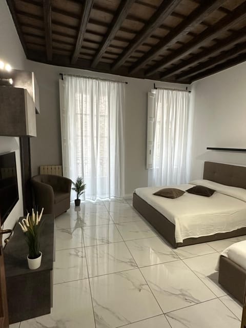 Bed, TV and multimedia, Living room, Photo of the whole room, Seating area, Bedroom