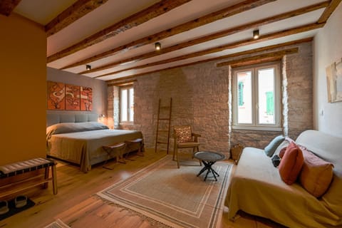 Bed, Seating area, Bedroom
