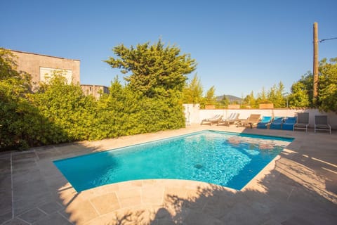 Property building, Living room, Swimming pool