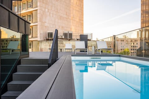 Property building, Pool view, Swimming pool, sunbed
