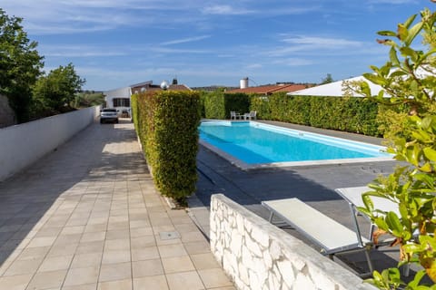 Property building, Living room, Swimming pool