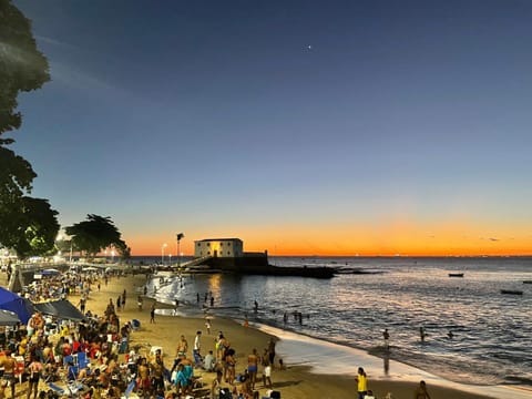 Nearby landmark, People, Natural landscape, Beach, Sunset