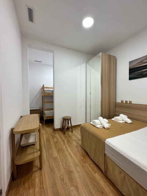 Bed, Photo of the whole room, Bedroom, bunk bed, towels, wardrobe