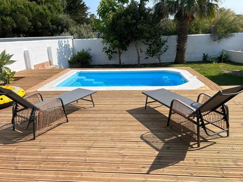 Property building, Living room, Swimming pool