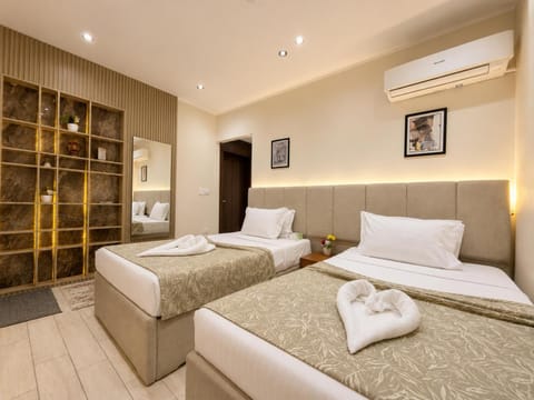 Bed, Photo of the whole room, Bedroom, towels, air conditioner