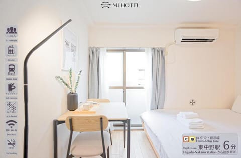 Bed, Dining area, Bedroom, Text overlay, towels, air conditioner