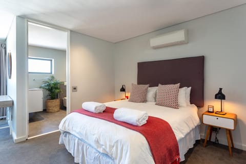 Bed, Photo of the whole room, Bedroom, towels, air conditioner