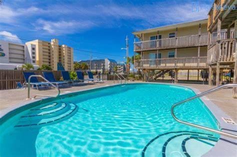 Property building, Day, Pool view, Swimming pool, sunbed