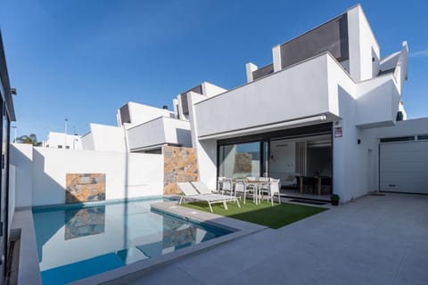 Property building, Pool view, Swimming pool, sunbed