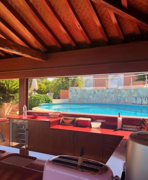 Kitchen or kitchenette, Pool view