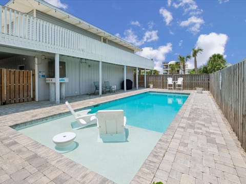 Property building, Patio, Seating area, Swimming pool