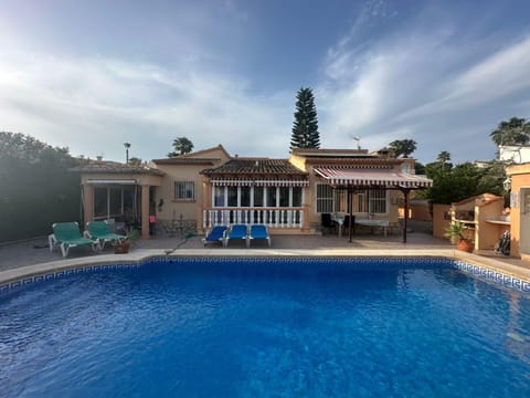 Property building, Patio, Swimming pool, sunbed