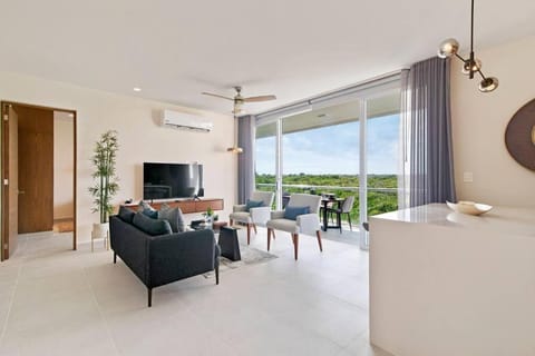 TV and multimedia, Living room, Seating area, Evening entertainment, fireplace, air conditioner