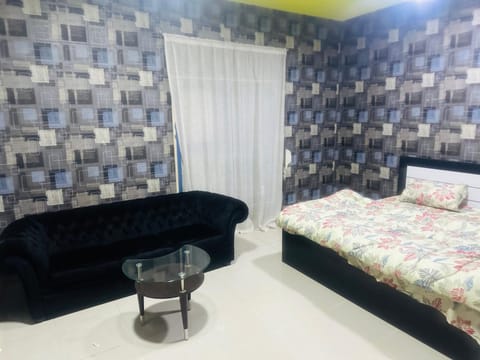 Bed, Living room, Seating area, Bedroom