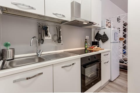 Kitchen or kitchenette, oven, stove