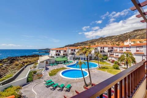 Property building, Living room, Swimming pool