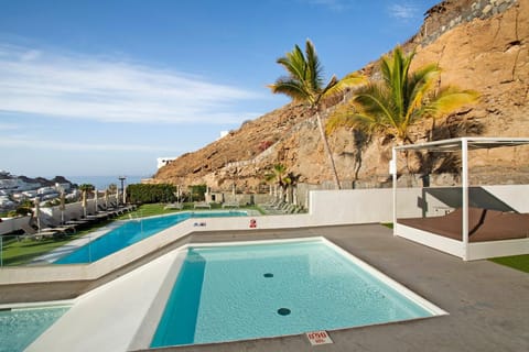 Property building, Living room, Swimming pool