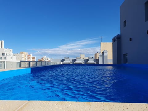 Property building, Day, BBQ facilities, Swimming pool