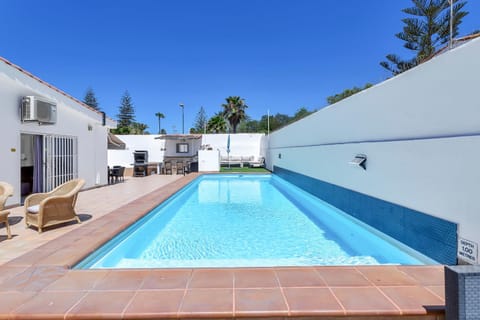 Property building, Living room, Swimming pool
