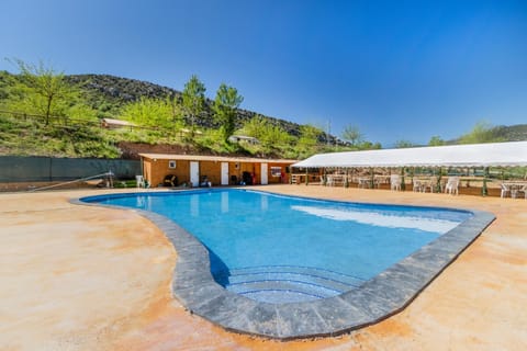 Property building, Living room, Swimming pool