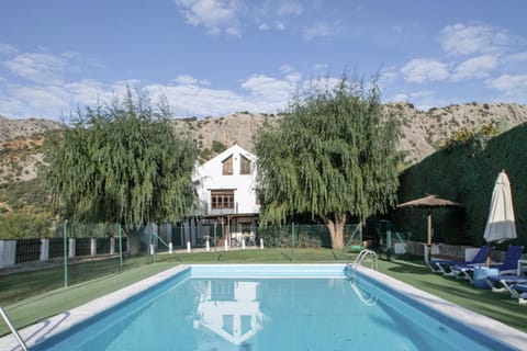 Property building, Living room, Swimming pool