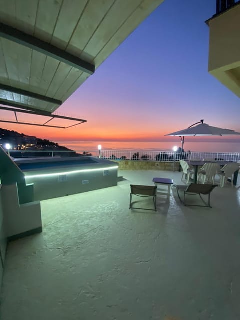 View (from property/room), Balcony/Terrace, Sea view, Swimming pool, Sunset, sunbed