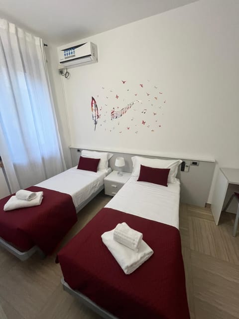 Bed, Photo of the whole room, Bedroom, towels, air conditioner