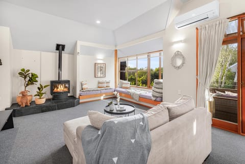 View (from property/room), Living room, Seating area, River view, Seasons, Sunset, air conditioner, air conditioner