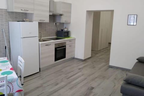 Kitchen or kitchenette, oven, stove