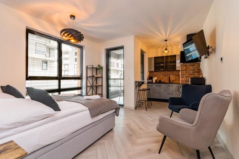 Communal lounge/ TV room, Bed, TV and multimedia, Living room, Photo of the whole room, Seating area, Evening entertainment