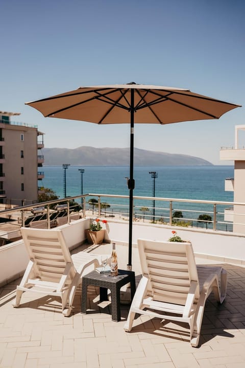 Patio, Nearby landmark, Day, Natural landscape, View (from property/room), Balcony/Terrace, Beach, Mountain view, Sea view, sunbed