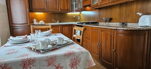 Kitchen or kitchenette, stove