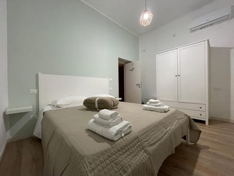 Bed, Photo of the whole room, Bedroom, towels, wardrobe, air conditioner