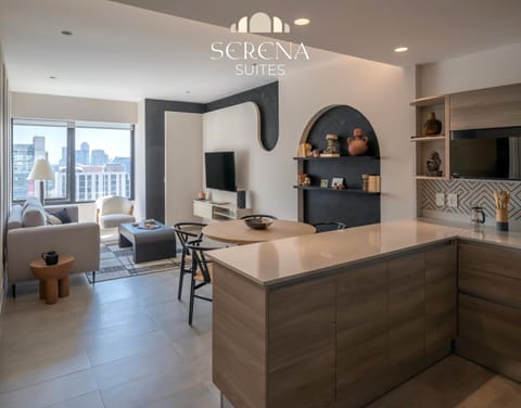 TV and multimedia, Coffee/tea facilities, Kitchen or kitchenette, Living room, Decorative detail, Seating area, Dining area