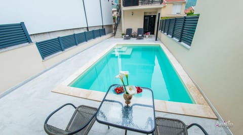Patio, Pool view, Swimming pool, sunbed