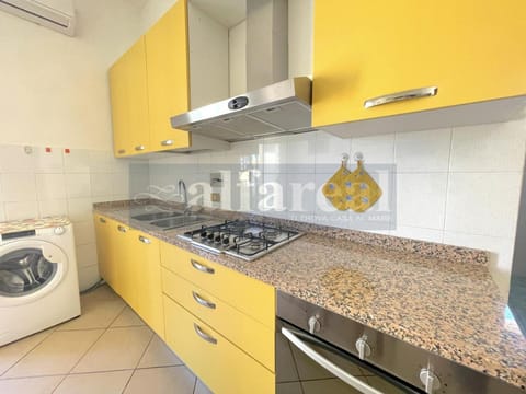 Kitchen or kitchenette, washing machine