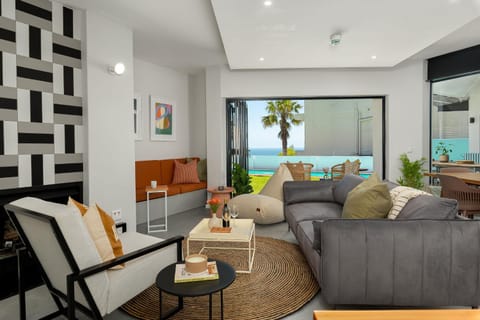 Communal lounge/ TV room, Living room, Seating area, Pool view, Sea view