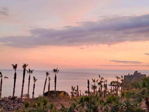 Nearby landmark, Natural landscape, Sea view, Sunset