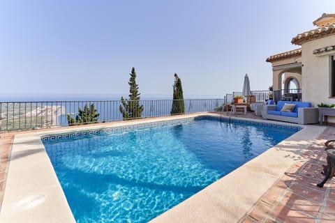 Property building, Living room, Swimming pool