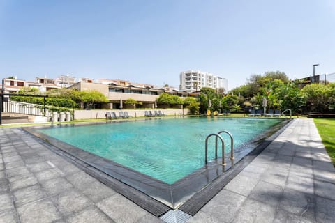 Property building, Living room, Swimming pool