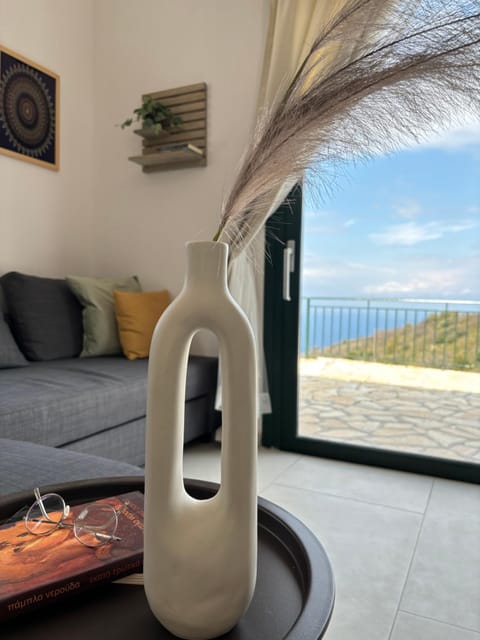 View (from property/room), Living room, Seating area, Mountain view, Sea view