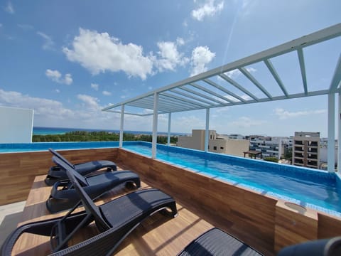 Property building, Patio, Off site, View (from property/room), Balcony/Terrace, Swimming pool, sunbed