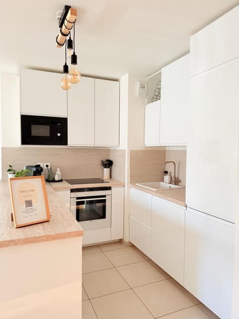 Kitchen or kitchenette, dishwasher, oven, stove, toaster