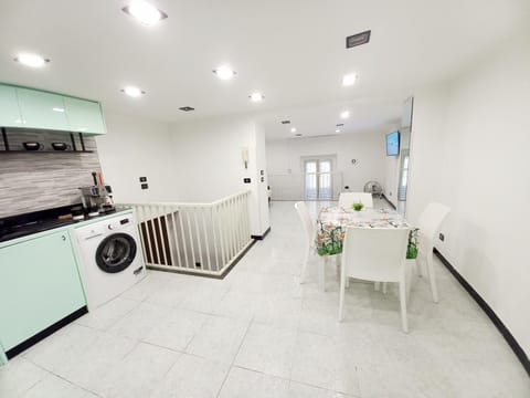 Kitchen or kitchenette, washing machine