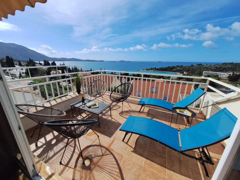 Property building, Patio, Off site, Day, Natural landscape, View (from property/room), Balcony/Terrace, Living room, Seating area, Mountain view, Sea view, sunbed