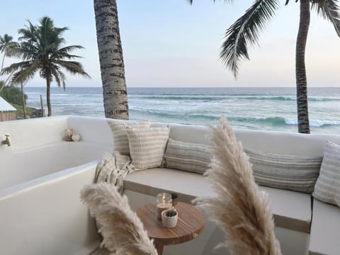 View (from property/room), Balcony/Terrace, Living room, Seating area, Beach, Sea view