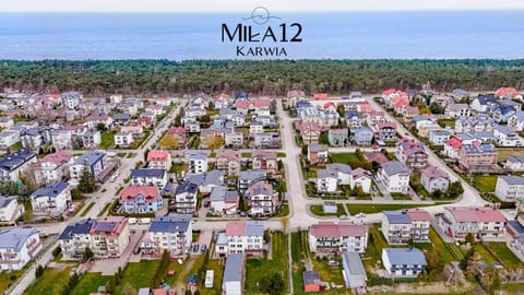 Property building, Day, Neighbourhood, Natural landscape, Bird's eye view, Text overlay, City view, Sea view, Street view, Location