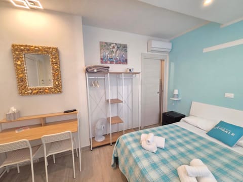 Bedroom, towels, wardrobe, air conditioner