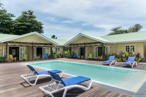 Property building, Patio, Pool view, Area and facilities, sunbed